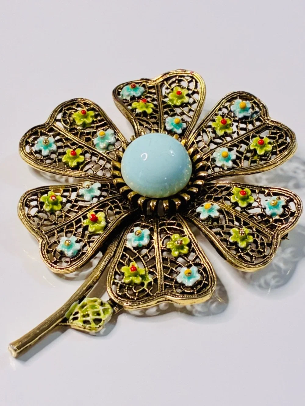 VTG Art Floral Filigree Flower Brooch with Pale Blue Cabochon Signed Oversized